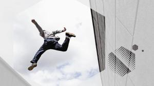 Man jumping between buildings